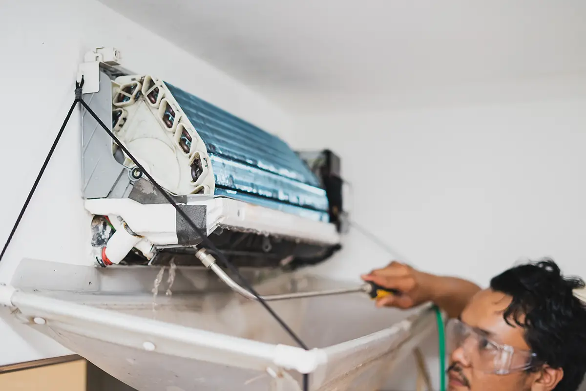 Man Repairing Ductless Unit