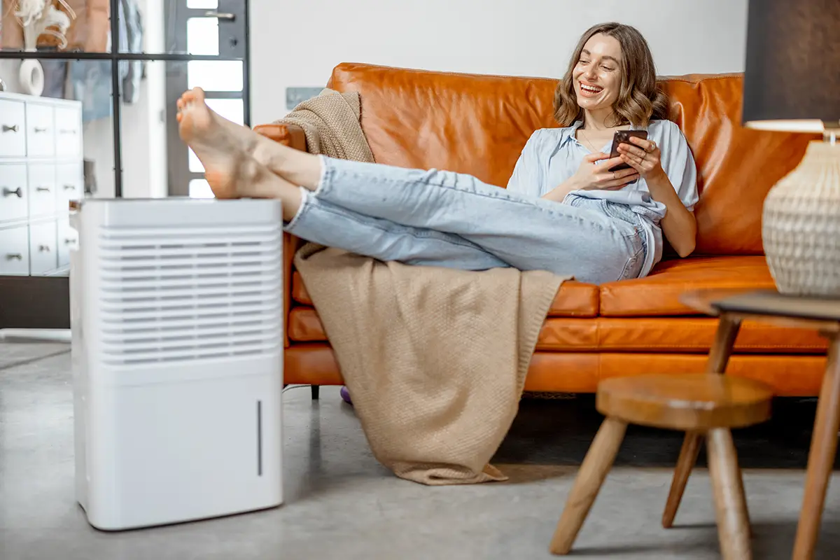 Woman Sitting by AC